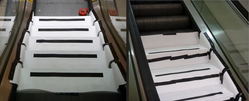 Reusable Escalator Step Covers, preconfigured with Non-Slip Safety Grip, installed, protecting escalator during remodel